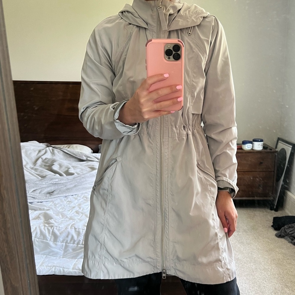 Athleta rain coat (small rips)